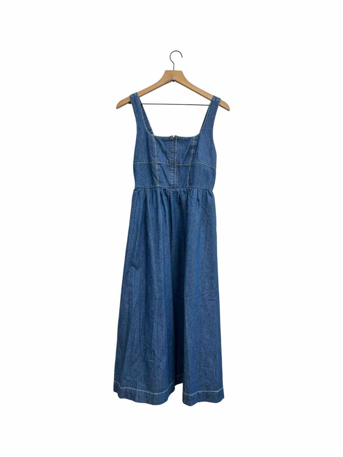 lone star denim dress Keep it classic and western with the Lone Star Denim Dress in Light Blue from cloth+paper+scissors. Made from soft and breathable cotton denim, it offers fitted styling with belt loops, cap